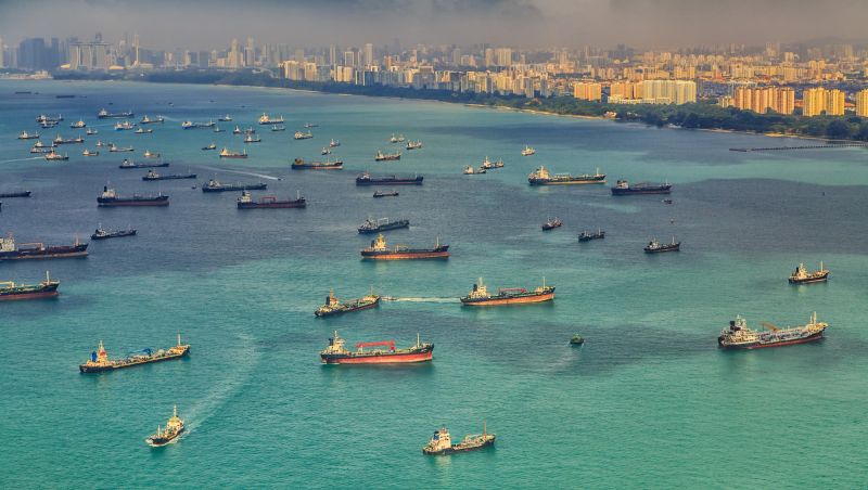 Cargo ships at busy Singapore ports