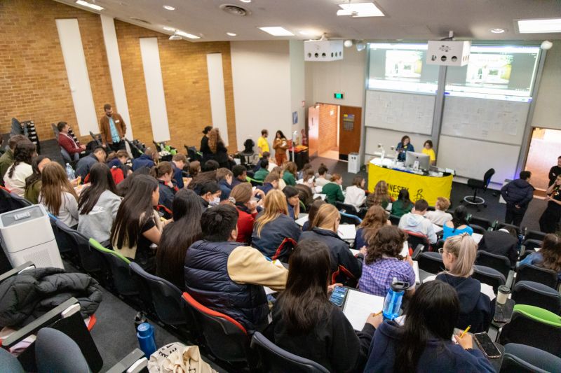Students at the University of Melbourne's Redmond Barry building for International Victorian Youth Social Change Lab