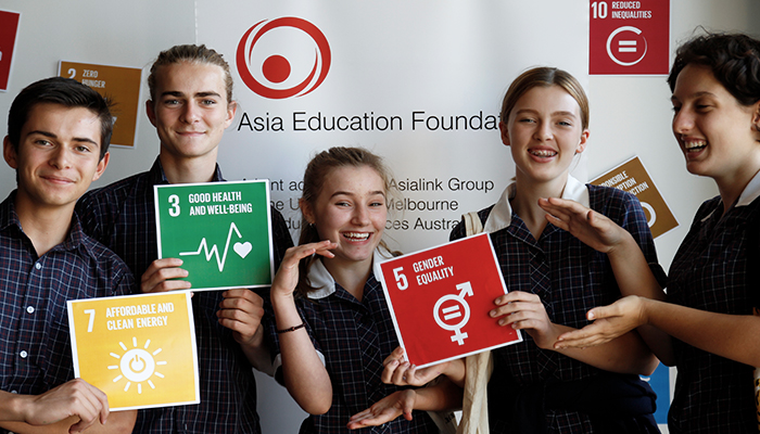 Youth held SDGs sign
